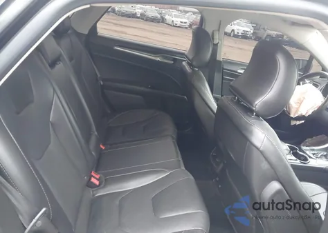 2016 Ford Fusion Titanium z USA, uszkodzony, nr VIN 3FA6P0D99GR162157